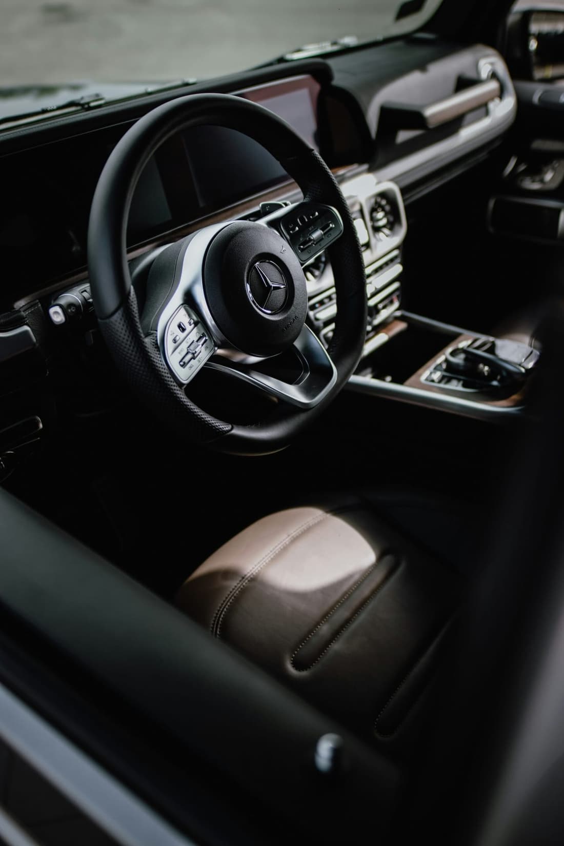 "Interior of a Mercedes spotless after detailing by Premier Detailing, showcasing clean seats, dashboard, and windows for a refreshed, polished look."