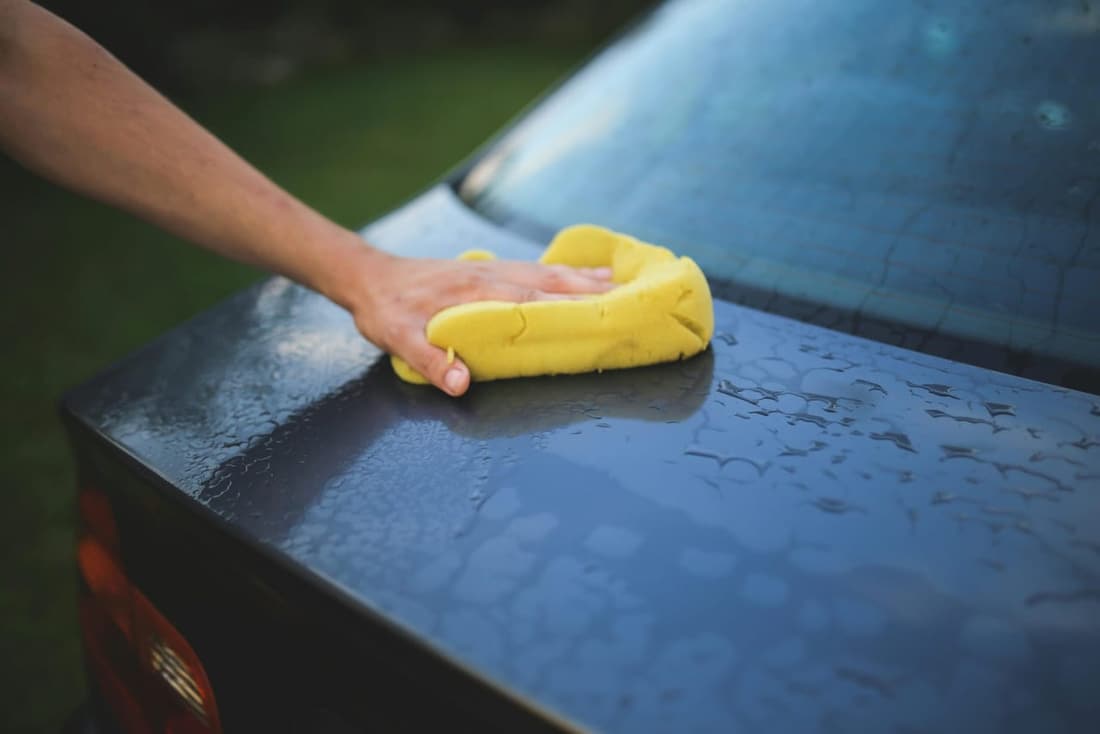 Car being hand-wiped for professional 'paint protection' at Premier Detailing in 'West Plains, MO.'