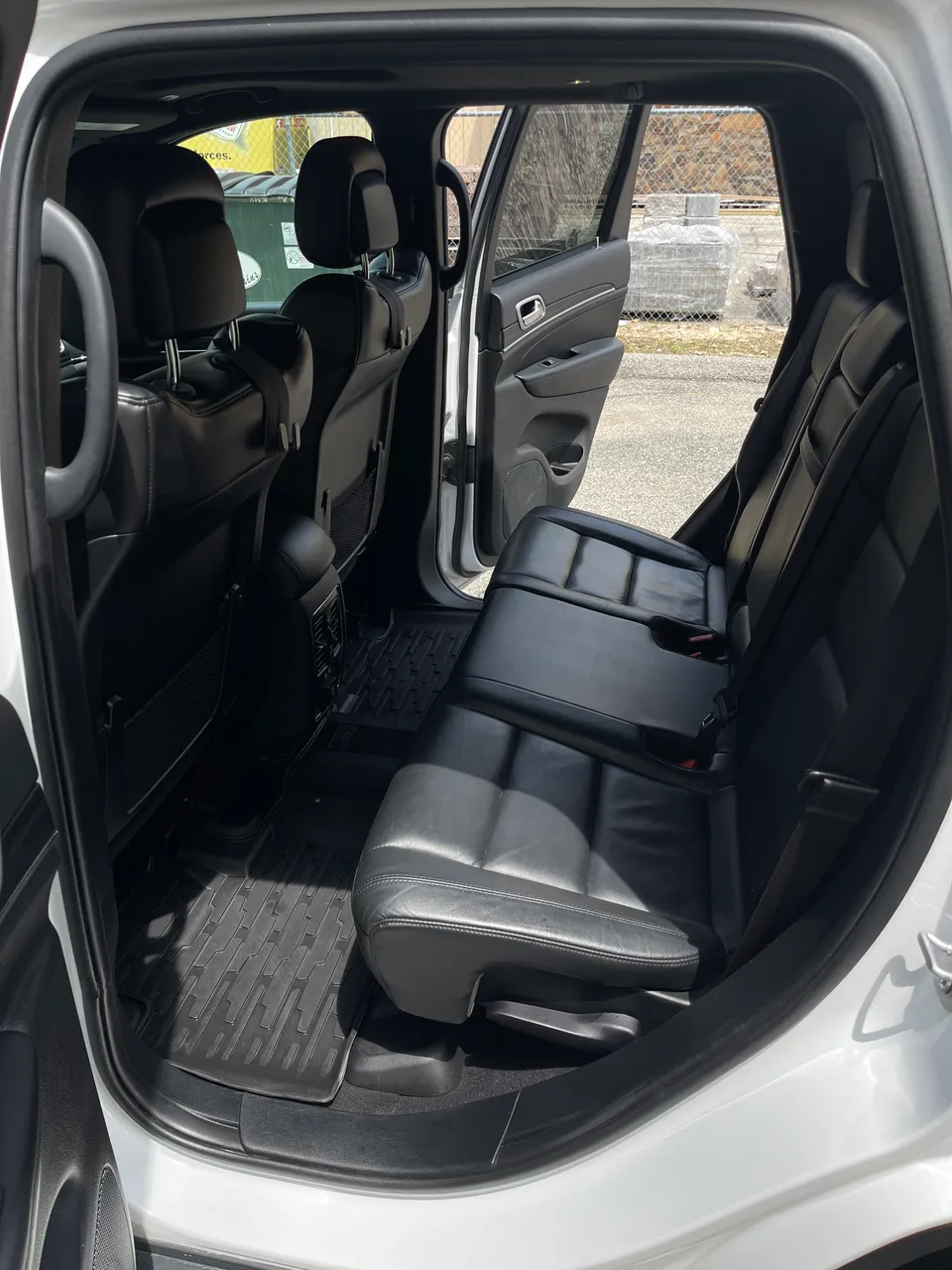 Detailed black leather rear seats in a Jeep Grand Cherokee, West Plains MO